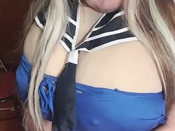 Susi is wearing a sailor outfit sucking