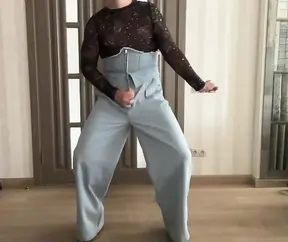 Crossdresser in blue high waist corset jeans, crop top and high heels cum and dance for her BDSM master like a cuckold