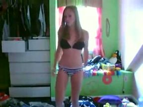 This sexy teen is dancing seductively in front of the webcam