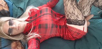 in a red dress and lace stockings