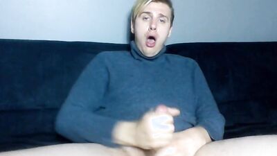 Amateur blond gay is jerking off in front of the camera