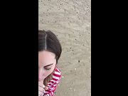 Blowjob on the beach. Her husband was fishing. She was sucking my dick.
