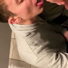 Twink gives a blowjob random guy in the public Restroom and takes cumshot on his face