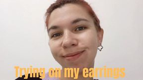 Trying on my earrings