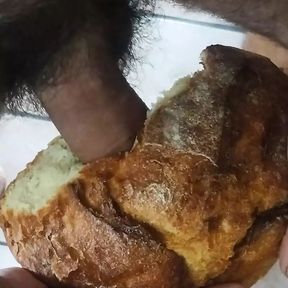 Cumming inside loaf of bread