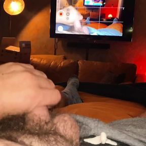 VERBAL Hairy Dad bates in Bed while watching himself on TV