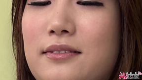 Japanese woman Mikuni Maisaki enjoys teasing herself with a toy on the couch