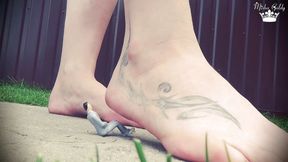 Misha Destroys a Tiny Man Toy by Her Ass, Between Huge Tits, in Mouth, Under Flip Flops and Feet