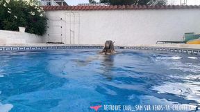 French mature beauty plays seductively by the pool