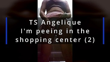 TS Angelique - I'm peeing in the shopping center (2)