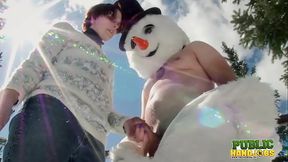 Redheaded Brandi de Lafey wanks snowman in frosty Cfnm Christmas scene