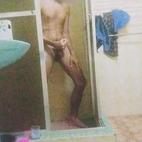 Brazilian man masturbating and taking a shower