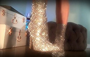Femdom mesmerize her slave with designer sparkle boots and metronome to make him weak and submissive