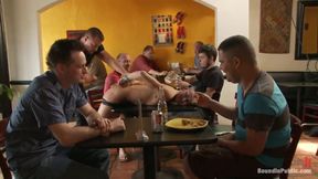 Restaurant patrons fuck a bad waiter and make him serve naked.