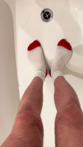 Jerking off into a wet sweaty sock in a bathtub, wet feet, dirty shoes, dirty wet smelly socks, water on feet