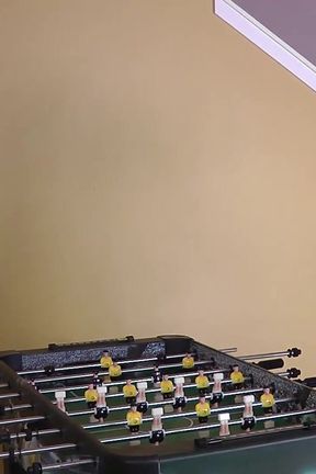 A Strip Foosball Game Promises a Spanking Treat at the End