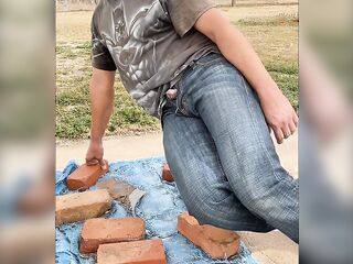 Taking a sneaky despairing public void urine outside with schlong thru jeans fly close to neighbors