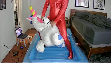 Inflatable toy ride to cum in red latex catsuit