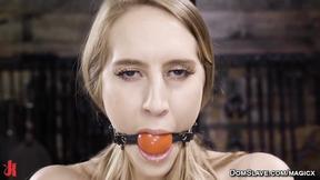 ”Blonde experiences machine fucking in a rope bondage”