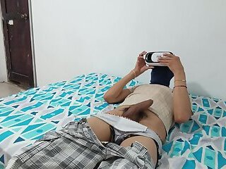 Masturbator masturbates while watching porn in his VR headset
