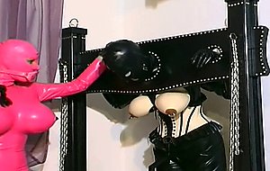 Two sweet german babes with inflated tits and gimp outfits