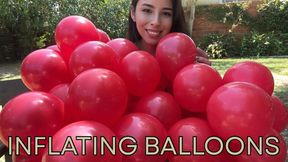 Inflating + 40 red balloons