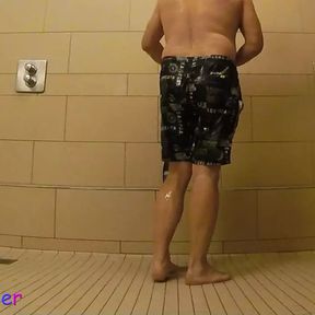 Pissing, wash, jerk off and finger in ass in a real public shower room