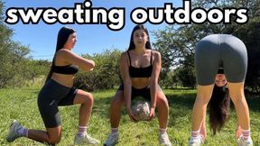 Sweating outdoors while I train.