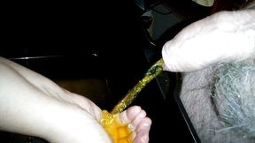 Jen is washing her hand in John's piss