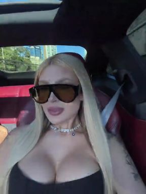 Blonde bombshell in car