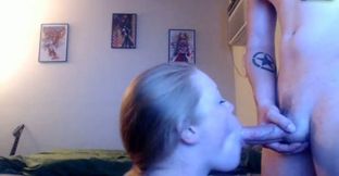 Cute blonde chick sucking shemale's dick and swallows with pleasure