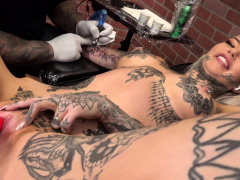 Amber Luke masturbates while getting tattooed