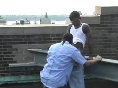 Sexy black gay partners engage in hardcore action on the roof top