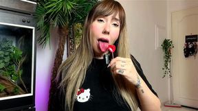 Licking a Red Lolipop
