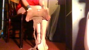 Putting on New Nylon Pantyhose Reinforced Suntan