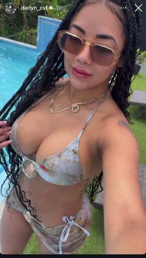 LATINA MODEL WITH BIG TITS FLAUNTS HER ASSETS