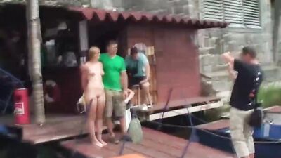 Charming blonde is stalked and filmed by a perverted voyeur
