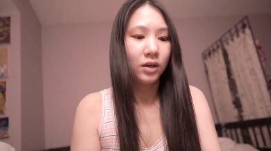 Brunette Asian cutie whispers pillow truth in ASMR