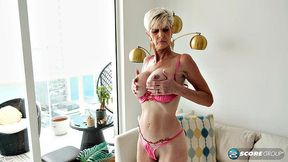 Meet Foxxxy, a 60-year-old wife with big tits and a pierced clit