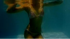 Two Asian Girls In Bikini Having Fun Underwater