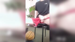 skinny hairy basketball player jerks away dick within adidas sports shorts, white socks, hairy legs