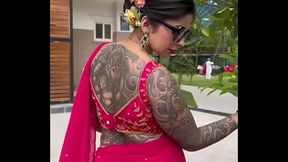 Backless Saree model and full body tatoo