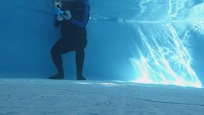 Handcuffed and helpless, in bodysuit