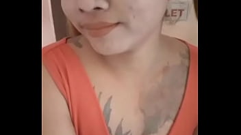 Beautiful Asian girl alone in her room