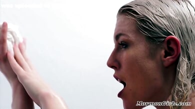 Blonde in sheer wet top explores herself under the shower stream