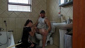 Petite slut sucking cock on toilet