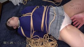 Helpless beauty struggles against tight rope bondage