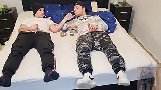 Gay couple smoking, kissing, wanking their big dicks, blowing and cumming on the ashtray