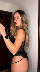 Kendra smoking with red lipstick