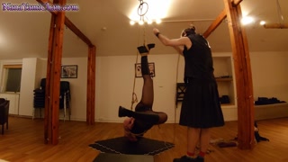 Booted suspension &amp; play in BDSM club